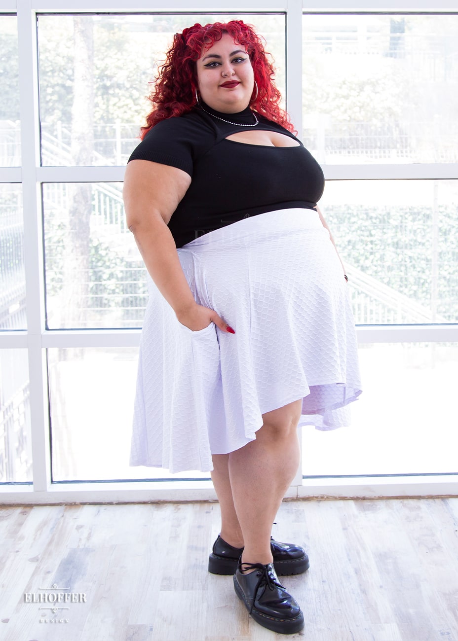 Victoria is modeling the Production 4XL. She has a 64” Chest, 60” Waist, 64” Hips, and is 5’5”.