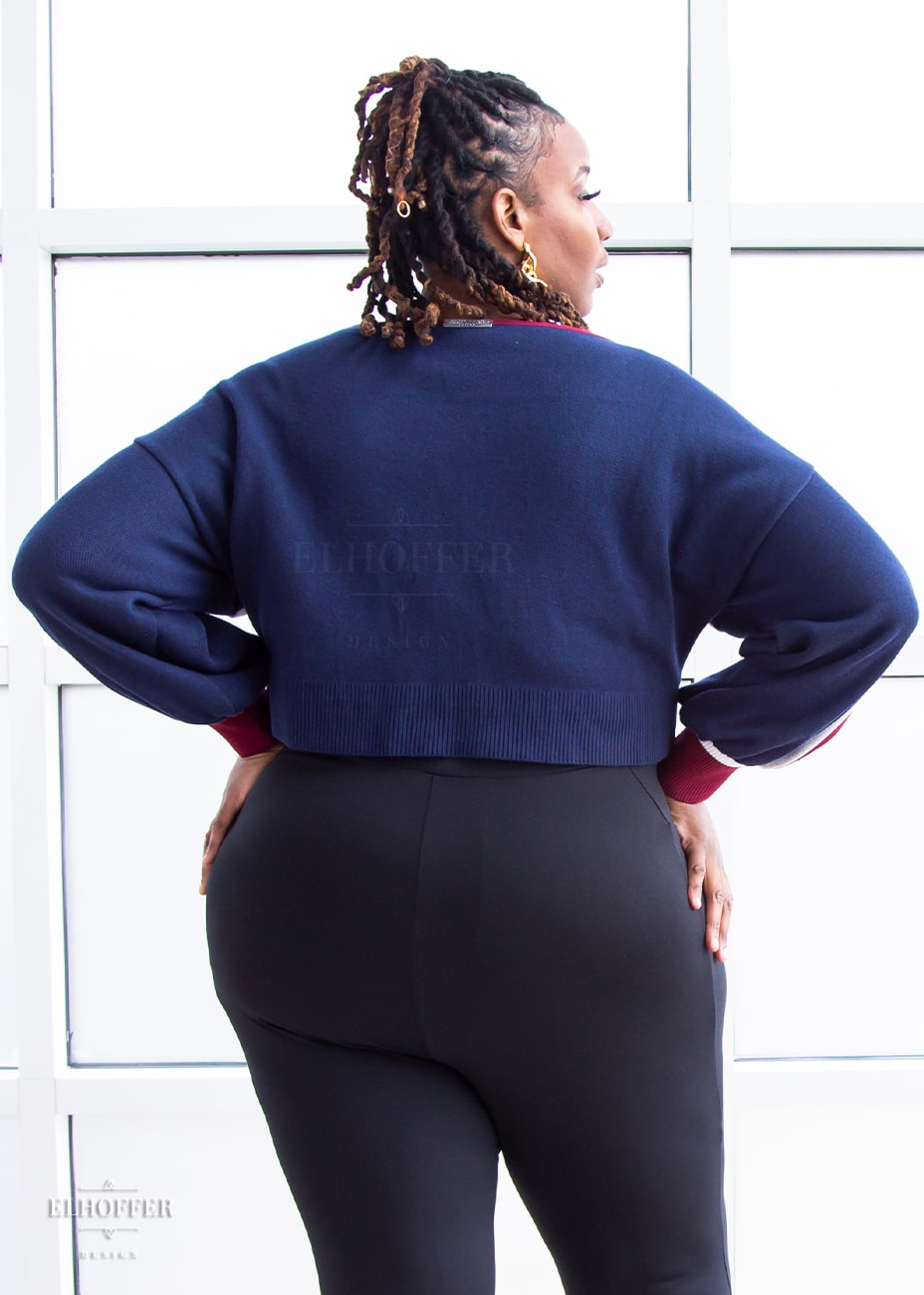 Myjah is modeling the Production 3XL/4XL. She has a 48” Bust, 43.5” Waist, 60” Hips, and is 6’1”.